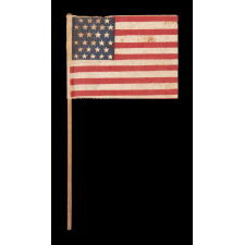 27 STAR ANTIQUE AMERICAN PARADE FLAG, MADE TO COMMEMORATE THE 1845 ADDITION OF FLORIDA AS THE 27th STATE, MOST LIKELY FOR DISPLAY AND DISTRIBUTION AT THE 1/5TH SCALE MODEL OF CASTILLO DE SAN MARCOS (a.k.a., FORT MARION), THAT HOUSED FLORIDA'S EXHIBITS AT THE 1893 CHICAGO WORLD’S FAIR / WORLD’S COLUMBIAN EXPO