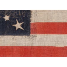 30 STAR FLAG OF THE PRE-CIVIL WAR ERA, A RARE AND BEAUTIFUL ANTIQUE EXAMPLE WITH A DOUBLE-WREATH CONFIGURATION THAT FEATURES A LARGE, HALOED CENTER STAR, WISCONSIN STATEHOOD, 1848-1850