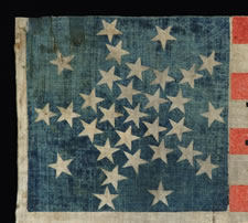 31 STARS, MADE FOR THE 1860 PRESIDENTIAL CAMPAIGN OF ABRAHAM LINCOLN & HANNIBAL HAMLIN, WITH STARS ARRANGED IN A VARIATION OF THE "GREAT STAR" CONFIGURATION WITH A STAR BETWEEN EACH ARM