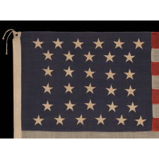 32 STARS, COMMEMORATING MINNESOTA STATEHOOD, CA 1892 – 1926, A VERY RARE FLAG, IN A SMALL SIZE, WITH AN HOURGLASS OR "GLOBAL ROWS" CONFIGURATION