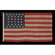 32 STARS, COMMEMORATING MINNESOTA STATEHOOD, CA 1892 – 1926, A VERY RARE FLAG, IN A SMALL SIZE, WITH AN HOURGLASS OR "GLOBAL ROWS" CONFIGURATION