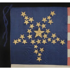 33 GILT-PAINTED STARS IN THREE DIFFERENT SIZES, ARRANGED IN AN INVERTED "GREAT STAR" PATTERN, ON AN ENTIRELY SILK FLAG; AN EXTRAORDINARY EXAMPLE, PROBABLY MADE FOR A STATE MILITIA UNIT, PRE-CIVIL WAR THROUGH WAR PERIOD, 1859-1861, OREGON STATEHOOD