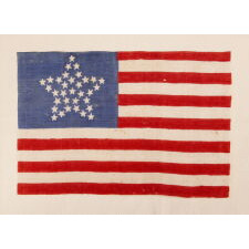 33 STARS ANTIQUE AMERICAN FLAG WITH A "GREAT STAR" CONFIGURATION ON A BRILLIANT, INDIGO BLUE CANTON, A RARE AND EXTRAORDINARY EXAMPLE, PRE-CIVIL WAR THROUGH THE WAR'S OPENING YEAR, 1859-1861, OREGON STATEHOOD