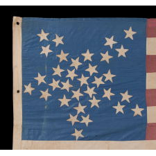 33 STARS IN A "GREAT STAR" OR "GREAT LUMINARY" PATTERN ON A HOMEMADE FLAG WITH A BEAUTIFUL, GLAZED COTTON CANTON, 1859-61, PRE-CIVIL WAR THROUGH WAR PERIOD, OREGON STATEHOOD