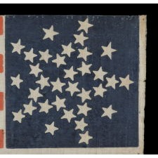 33 STARS IN AN INTERESTING VARIATION OF THE "GREAT STAR" CONFIGURATION, MADE FOR THE 1860 CAMPAIGN OF ABRAHAM LINCOLN & HANNIBAL HAMLIN, WITH WHIMSICAL SERPENTINE TEXT