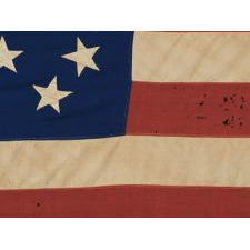 34 STAR AMERICAN NATIONAL FLAG WITH A UNIQUE "GREAT STAR" PATTERN, FLANKED BY ARCHED BRACKETS, CIVIL WAR PERIOD, 1861-63, SEEMINGLY OF PROVENCETOWN MASSACHUSETTS ORIGIN