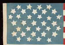 34 STAR CIVIL WAR FLAG with TWO SIZES OF DIFFERENTLY SHAPED STARS in ROWS on a CORNFLOWER BLUE CANTON, ENTIRELY HAND-SEWN