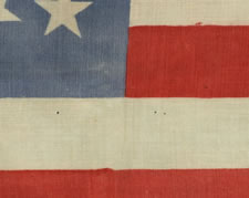 34 STAR, CIVIL WAR PERIOD (1861-63), A PRESS-DYED, MERINO WOOL FLAG WITH A HAND-SEWN COTTON HOIST AND GREAT, DUSTY BLUE COLORATION