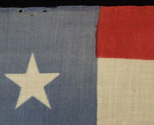 34 STAR, CIVIL WAR PERIOD (1861-63), A PRESS-DYED, MERINO WOOL FLAG WITH A HAND-SEWN COTTON HOIST AND GREAT, DUSTY BLUE COLORATION