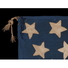 34 STAR, HAND-SEWN, HOMEMADE, ANTIQUE AMERICAN FLAG OF THE CIVIL WAR PERIOD, MADE OF A COMBINATION OF SALVAGED FABRICS, INCLUDING MENS' SHIRTING, 1861-1863, OPENING YEARS OF THE WAR, REFLECTS THE ADDITION OF KANSAS