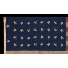 34 STARS IN 4 ROWS WITH 2 STARS OFFSET AT THE HOIST END, LIKELY A UNION ARMY CAMP COLORS, ONE OF ONLY THREE EXAMPLES I HAVE ENCOUNTERED IN THIS EXACT STYLE, OPENING TWO YEARS OF THE CIVIL WAR, 1861-1863, REFLECTS THE PERIOD WHEN KANSAS WAS THE MOST RECENT STATE TO JOIN THE UNION