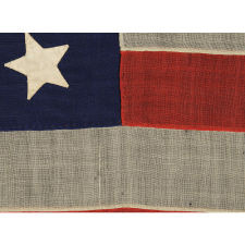 34 STARS ON AN ANTIQUE AMERICAN FLAG OF THE CIVIL WAR PERIOD, MADE BY WILLIAM G. MINTZER IN PHILADELPHIA, PENNSYLVANIA, 1861-63, REFLECTS KANSAS STATEHOOD