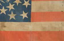 34 STARS, CIVIL WAR PERIOD (1861-63), THE LARGEST KNOWN PARADE FLAG WITH AN EAGLE IN THE CANTON, EXTRAORDINARILY RARE AND ONE OF A KIND AMONG KNOWN EXAMPLES, USED IN THE 1872 PRESIDENTIAL CAMPAIGN OF GRANT & WILSON