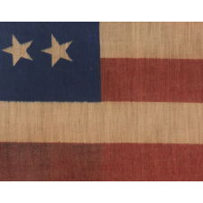 34 STARS, CIVIL WAR PERIOD, PRINTED ON A WOOL BLENDED FABRIC, RARE NOTCHED DESIGN WITH TILTED STARS, POSSIBLY A UNION ARMY CAMP COLORS