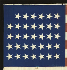 34 STARS, CIVIL WAR PERIOD, PRINTED ON A WOOL BLENDED FABRIC, RARE NOTCHED DESIGN WITH TILTED STARS, POSSIBLY A UNION ARMY CAMP COLORS