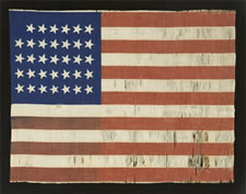 34 STARS, CIVIL WAR PERIOD, PRINTED ON A WOOL BLENDED FABRIC, RARE NOTCHED DESIGN WITH TILTED STARS, POSSIBLY A UNION ARMY CAMP COLORS