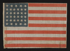 34 STARS, A CIVIL WAR PERIOD PARADE FLAG WITH SCATTERED STAR POSITIONING, KANSAS STATEHOOD, 1861-63