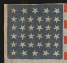 34 STARS, A CIVIL WAR PERIOD PARADE FLAG WITH SCATTERED STAR POSITIONING, KANSAS STATEHOOD, 1861-63