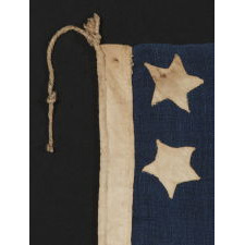 34 STARS, IN A CONFIGURATION THAT IS UNIQUE TO THIS SMALL SCALE, CIVIL WAR FLAG, WITH SUBSTANTIAL FOLK ART QUALITIES, 1861-63, KANSAS STATEHOOD