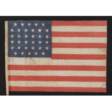 34 STARS IN A "GLOBAL ROWS" PATTERN ON FLAG MADE DURING THE OPENING TWO YEARS OF THE CIVIL WAR, 1861-63, KANSAS STATEHOOD