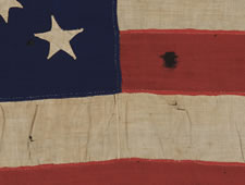 34 STARS IN A RARE AND BEAUTIFUL SNOWFLAKE OR STARBURST MEDALLION, A PRESENTATION BATTLE FLAG MADE BY THE LADIES OF LOMBARD, ILLINOIS FOR THE 8TH ILLINOIS CAVALRY, ONE OF THE HARDEST FIGHTING REGIMENTS OF THE CIVIL WAR, WITH PROBABLE PRO-UNION SYMBOLISM,