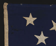 34 STARS IN A RARE AND BEAUTIFUL SNOWFLAKE OR STARBURST MEDALLION, A PRESENTATION BATTLE FLAG MADE BY THE LADIES OF LOMBARD, ILLINOIS FOR THE 8TH ILLINOIS CAVALRY, ONE OF THE HARDEST FIGHTING REGIMENTS OF THE CIVIL WAR, WITH PROBABLE PRO-UNION SYMBOLISM,