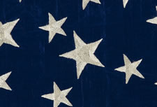 35 HAND-EMBROIDERED STARS IN 3 DIFFERENT SIZES, ARRANGED IN THE FORM OF A WHIMSICAL "GREAT STAR" PATTERN, A MASTERPIECE AMONG KNOWN EXAMPLES, IN A RARE SMALL SIZE, MADE OF SILK, CIVIL WAR PERIOD, WEST VIRGINIA STATEHOOD, 1863-65