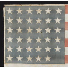 35 STARS IN A NOTCHED PATTERN ON A FLAG MADE FOR THE 1864 PRESIDENTIAL CAMPAIGN OF ABRAHAM LINCOLN & ANDREW JOHNSON; A MONUMENTAL EXAMPLE AND THE SECOND TO THE LARGEST KNOWN AMONG ALL CAMPAIGN PARADE FLAGS OF THE 19TH CENTURY, ACROSS ALL ELECTIONS