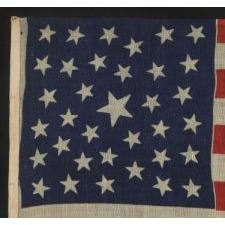 35 STARS, PROBABLY A CIVIL WAR CAMP COLORS, WEST VIRGINIA STATEHOOD, 1863-1865, ONE OF A TINY HANDFUL OF PRESS-DYED WOOL FLAGS WITH A RANDOM CONFIGURATION OF STARS