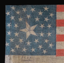 35 STARS, USED IN THE 1868 PRESIDENTIAL CAMPAIGN OF ULYSSES S. GRANT, A RARE, MEDALLION PATTERN PARADE FLAG WITH A LARGE, PIE-CUT CENTER STAR AND TWO STARS IN EACH CORNER, PRODUCED IN THE CIVIL WAR PERIOD, 1863-65