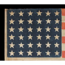 36 STAR ANTIQUE AMERICAN PARADE FLAG OF THE CIVIL WAR ERA, IN AN ESPECIALLY LARGE SCALE AND WITH BOLD COLOR, 1864-67, NEVADA STATEHOOD