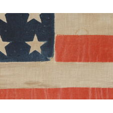 36 STAR ANTIQUE AMERICAN PARADE FLAG OF THE CIVIL WAR ERA, IN AN ESPECIALLY LARGE SCALE AND WITH BOLD COLOR, 1864-67, NEVADA STATEHOOD