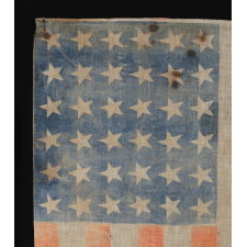 36 STAR ANTIQUE AMERICAN PARADE FLAG OF THE CIVIL WAR ERA, IN AN ESPECIALLY LARGE SCALE AND WITH ENDEARING WEAR, 1864-67, NEVADA STATEHOOD