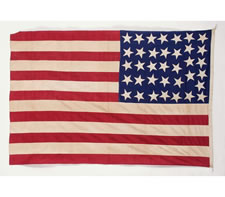 36 STARS ON A BEAUTIFUL GLAZED COTTON CANTON (COTTON CHINTZ), ENTIRELY HAND-SEWN, CIVIL WAR ERA, 1864-1867, IN A GREAT, SMALL SIZE, A HOMEMADE EXAMPLE