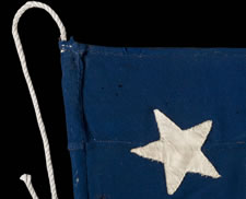 36 STARS IN A MEDALLION CONFIGURATION ON AN ENTIRELY HAND-SEWN FLAG WITH A BEAUTIFULLY ELONGATED FORMAT, CIVIL WAR ERA, 1864-67, NEVADA STATEHOOD