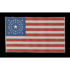 37 STAR ANTIQUE AMERICAN FLAG WITH A DOUBLE-WREATH CONFIGURATION, PROBABLY MADE FOR THE CELEBRATION OF THE CENTENNIAL OF AMERICAN INDEPENDENCE IN 1876, REFLECTS THE TIME DURING WHICH NEBRASKA WAS THE MOST RECENT STATE TO JOIN THE UNION