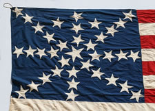 37 STARS IN A DYNAMIC STARBURST, ONE OF THE MOST SPECTACULAR  CONFIGURATIONS THAT HAS EVER SURFACED  IN THE HISTORY OF FLAG COLLECTING, POSSIBLY MADE WITH SOUTHERN SYMPATHIES, 1867-1876