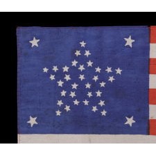 37 STARS IN THE “GREAT STAR” PATTERN WITH A STAR IN EACH CORNER, A RARE, BEAUTIFUL, AND DESIRABLE DESIGN, MADE DURING THE PERIOD OF RECONSTRUCTION OF THE SOUTH, POSSIBLY FOR THE CELEBRATION OF THE CENTENNIAL OF AMERICAN INDEPENDENCE, NEBRASKA STATEHOOD, 1867-1876