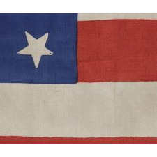 37 STARS ON A LARGE SCALE SILK PARADE FLAG WITH "DANCING" OR "TUMBLING" ORIENTATION, NEBRASKA STATEHOOD, 1867-1876, THE ERA OF AMERICAN RECONSTRUCTION