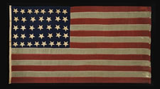 37 UPSIDE-DOWN STARS, ENTIRELY HAND-SEWN, NEBRASKA STATEHOOD, 1867-1876, THE ERA OF AMERICAN RECONSTRUCTION