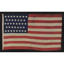 38 HAND-SEWN STARS ON AN ANTIQUE FLAG IN A SMALL SCALE FOR THE 19TH CENTURY, SIGNED ALBANY, NEW YORK, 1876-1889, COLORADO STATEHOOD