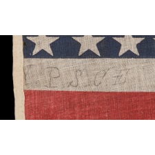 38 STAR ANTIQUE AMERICAN FLAG, MADE DURING THE PERIOD WHEN COLORADO WAS THE MOST RECENT STATE TO JOIN THE UNION, 1876-1889, WITH PENCILED INSCRIPTION FROM THE YOUNG PEOPLE'S SOCIETY OF CHRISTIAN ENDEAVOR (YPSCE), EX-RICHARD PIERCE COLLECTION OF AMERICAN FLAGS, ILLUSTRATED IN HIS BOOK "THE STARS & THE STRIPES"