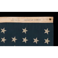 38 STAR ANTIQUE AMERICAN FLAG WITH A NOTCHED CONFIGURATION, MADE BY THE U.S. BUNTING COMPANY IN LOWELL, MASSACHUSETTS, REFLECTS THE ERA OF COLORADO STATEHOOD, circa 1876-1889