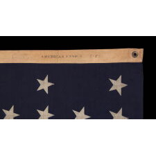 38 STAR ANTIQUE AMERICAN FLAG WITH A NOTCHED CONFIGURATION, MADE BY THE U.S. BUNTING COMPANY IN LOWELL, MASSACHUSETTS, REFLECTS THE ERA OF COLORADO STATEHOOD, circa 1876-1889