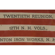 38 STAR ANTIQUE AMERICAN FLAG WITH A RARE AND BEAUTIFUL VARIATION OF THE "GREAT STAR" OR "GREAT LUMINARY" PATTERN, AN EXAMPLE OF EXTRAORDINARY QUALITY, MADE BY R.W. MUSGROVE IN BRISTOL, NEW HAMPSHIRE FOR AN 1885 REUNION OF THE 12th NH VOLUNTEERS