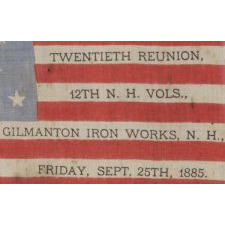 38 STAR FLAG WITH A RARE AND BEAUTIFUL VARIATION OF THE "GREAT STAR" OR "GREAT LUMINARY" PATTERN, AN EXAMPLE OF EXTRAORDINARY QUALITY, MADE BY R.W. MUSGROVE IN BRISTOL, NEW HAMPSHIRE FOR AN 1885 REUNION OF THE 12th NH VOLUNTEERS