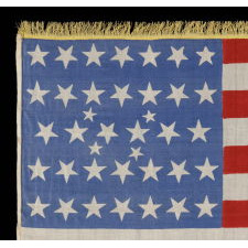 38 STARS IN AN EXTREMELY RARE LINEAL CONFIGURATION THAT HAS 4 TINY STARS EMBEDDED IN THE PATTERN, FORMERLY IN THE COLLECTION OF RICHARD PIERCE AND PICTURED IN HIS TEXT ON FLAG COLLECTING