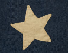 38 STARS IN A NOTCHED CONFIGURATION, ENTIRELY HAND-SEWN, MADE BY WILLIAM J. POWELL IN NEW YORK CITY BETWEEN 1881 AND 1885, (COLORADO STATEHOOD)