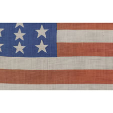 39 STAR ANTIQUE AMERICAN FLAG WITH AN ELONGATED FORMAT AND TWO SIZES OF STARS IN ALTERNATING COLUMNS, NEVER AN OFFICIAL STAR COUNT, 1876