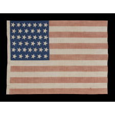 39 TILTED STARS ON AN ANTIQUE AMERICAN FLAG WITH A ROYAL BLUE CANTON, NEVER AN OFFICIAL STAR COUNT, 1876-1889